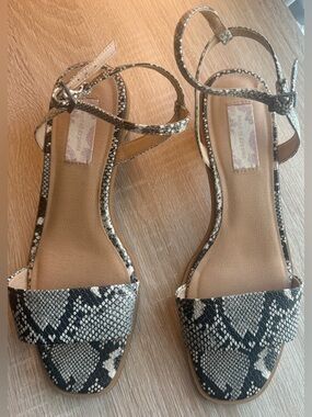Band of Gypsies Snakeskin Strappy Sandals in Black & White. Round heel 1 1/2 in.